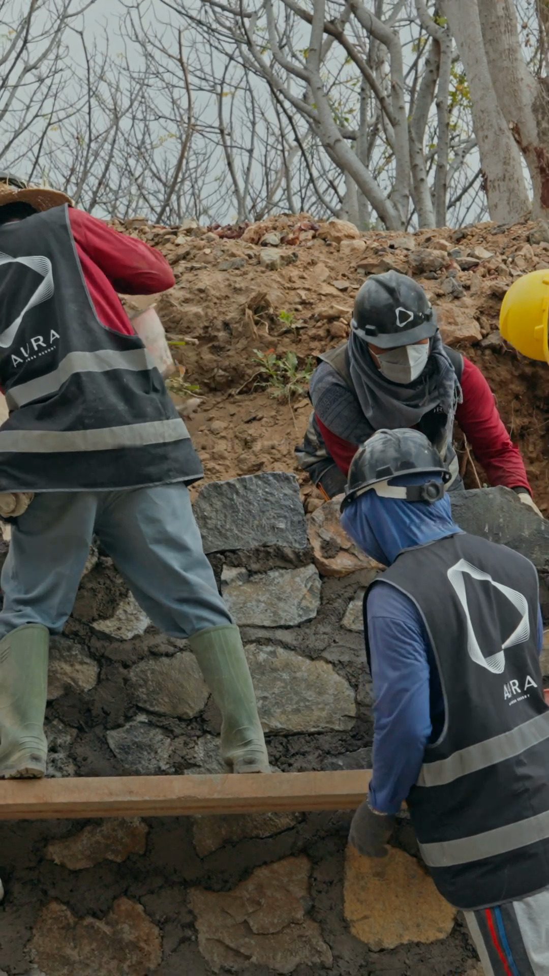Retaining walls built by hand on the AURA site